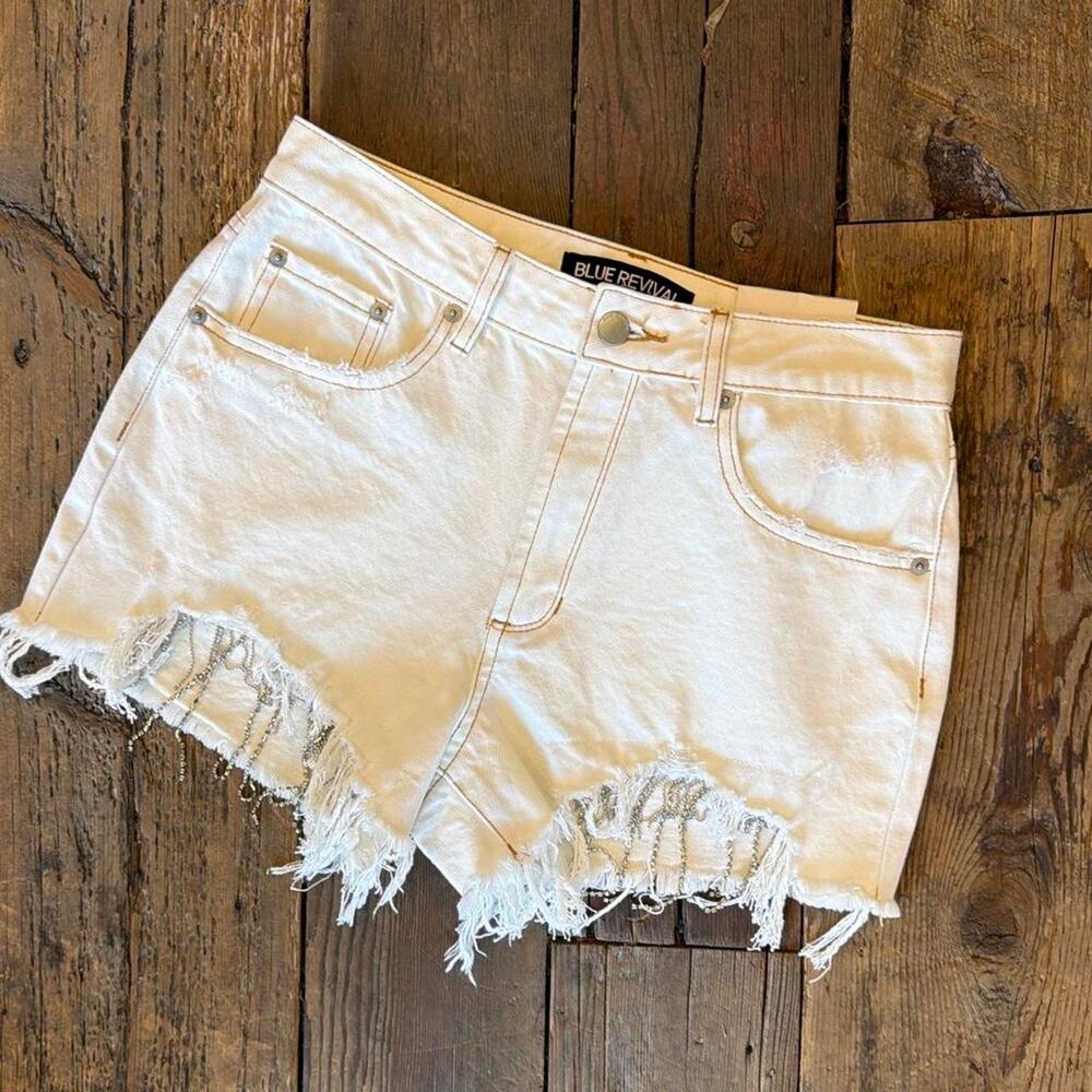 White denim shorts with frayed
